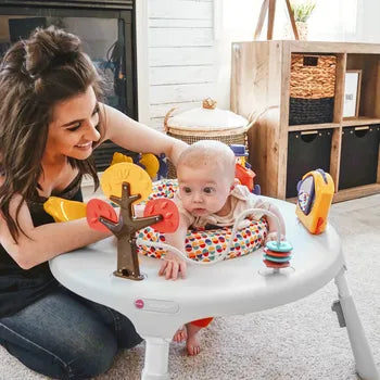 "He loves to look around and watch his big brother play. Now he gets to play and explore all on his own with his new PortaPlay table!"